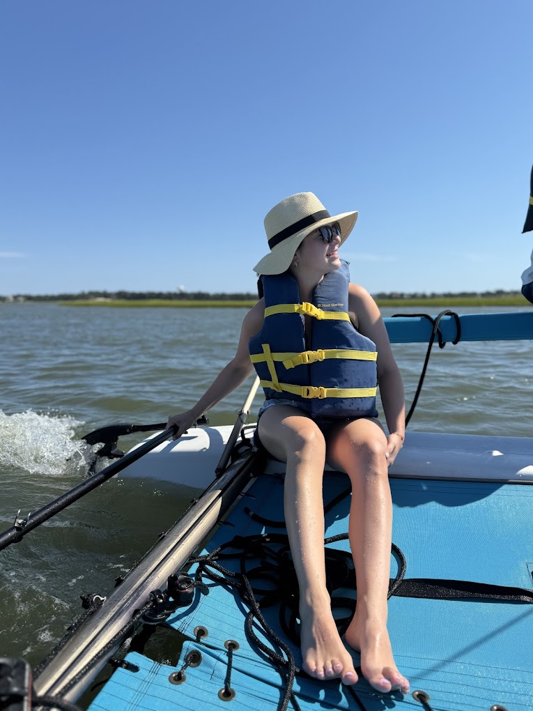 Guest enjoying the breeze on the trampoline of the Hobie Cat