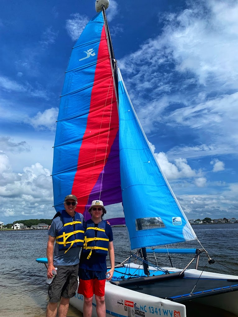Father and son before a Hobie Cat sailing lesson